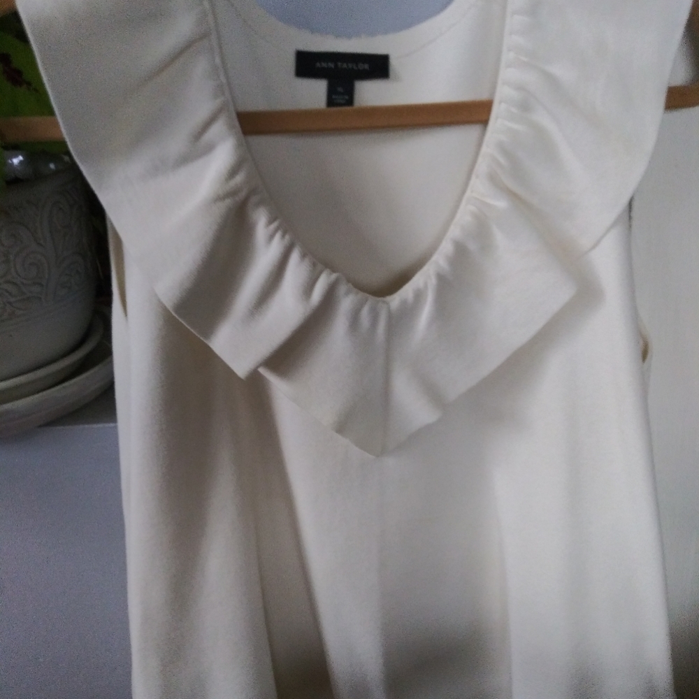 Sleeveless white top